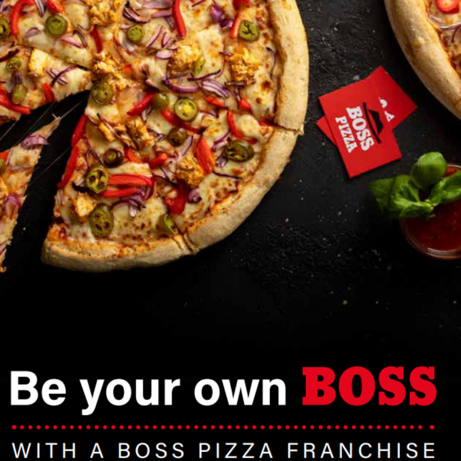 pizza off to the side with Boss Pizza business cards laid on the table with the words 