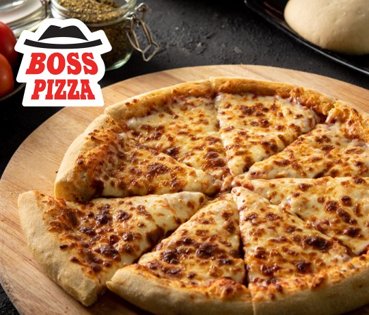 Boss Pizza Margherita on a wooden chopping board surronded by ingredients and boss pizza logo