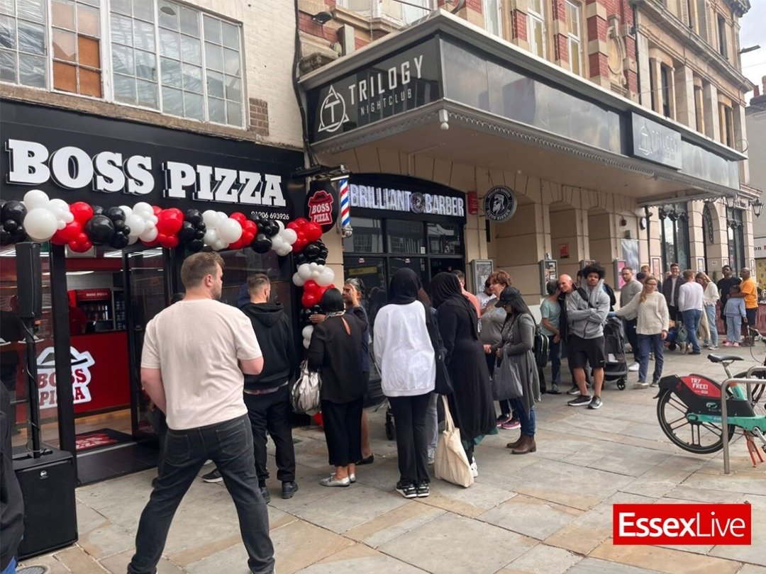 People queue out the door for new pizza spot on its opening day